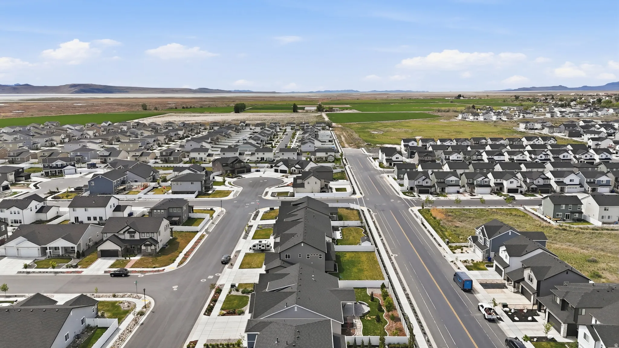Aerial view of residential area with a mountain backdrop