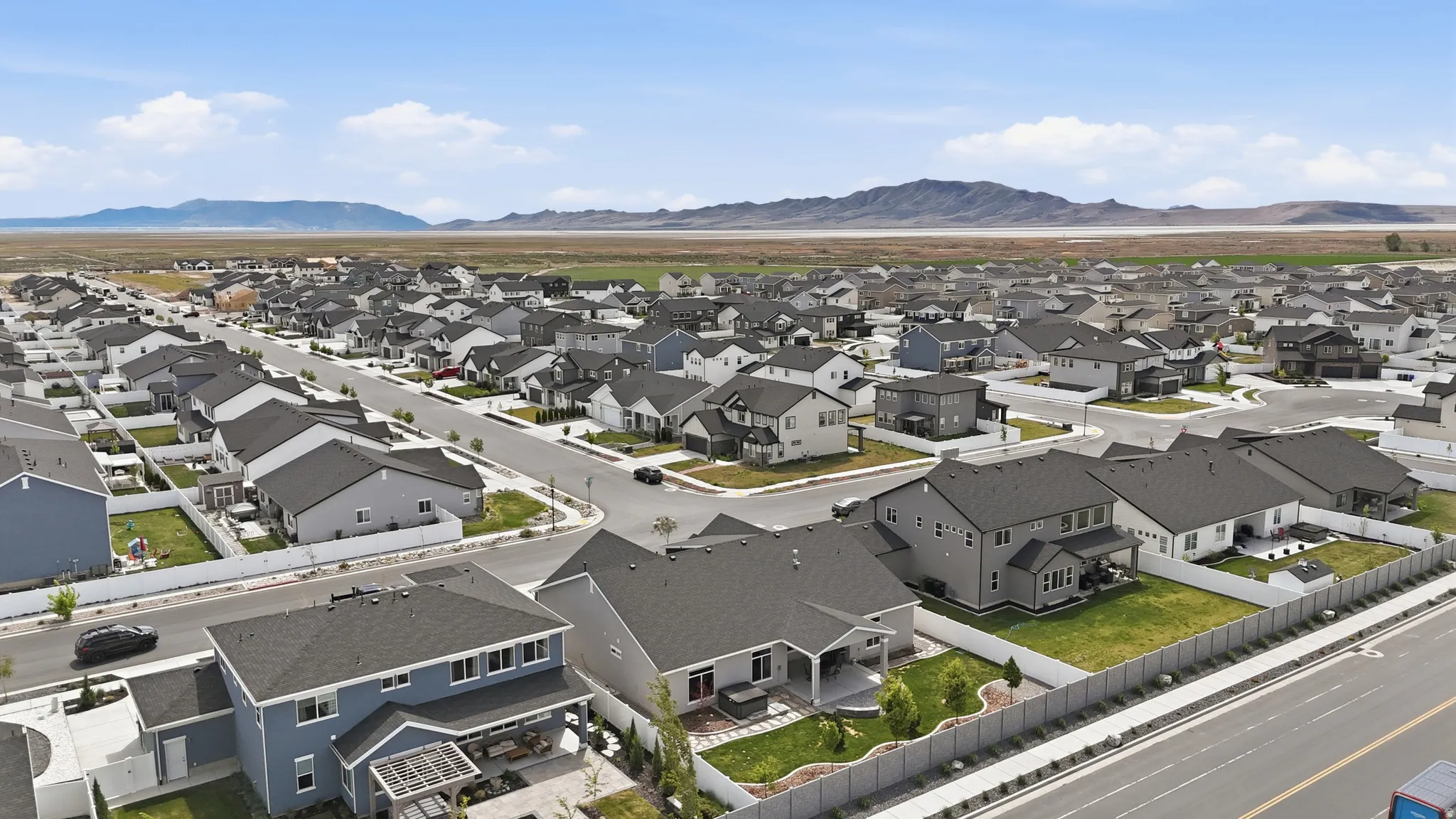 Aerial perspective of suburban area featuring mountains