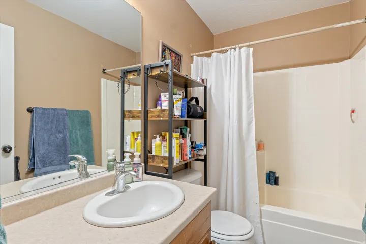 Full bathroom featuring vanity and shower / bath combo
