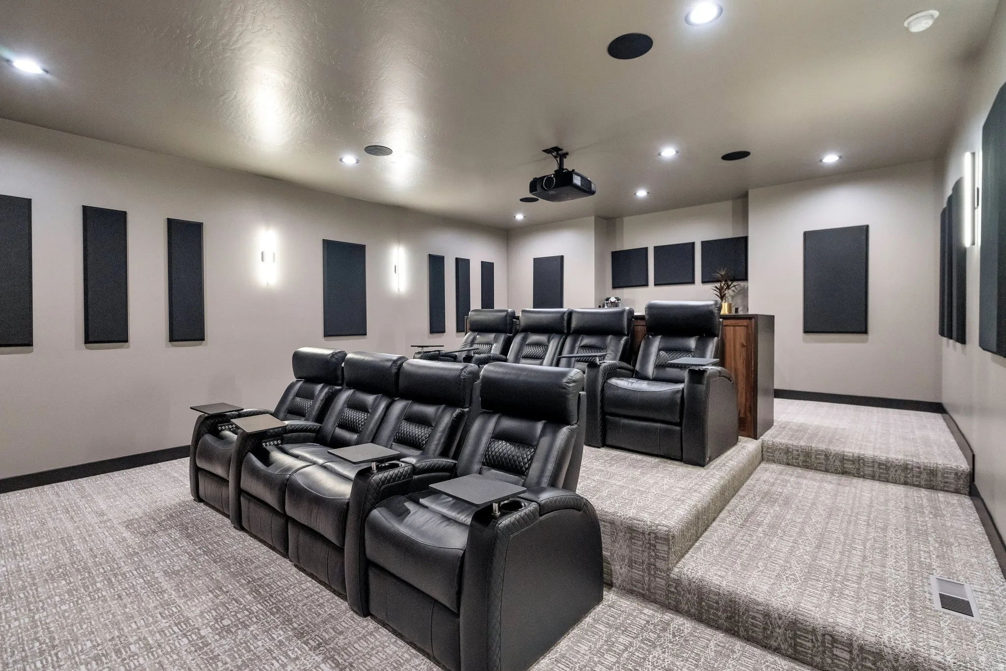 Home theater featuring light colored carpet and recessed lighting