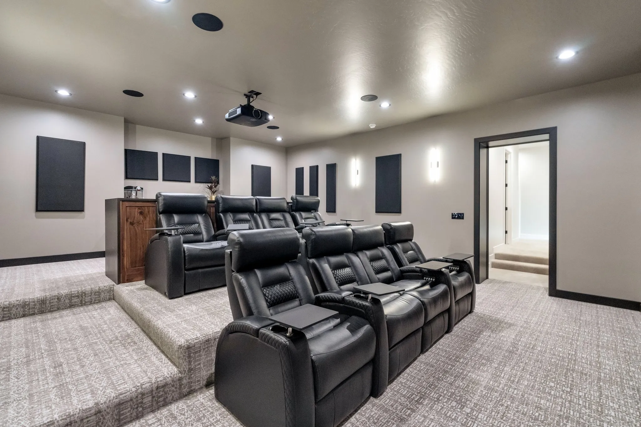 Cinema featuring light carpet and recessed lighting