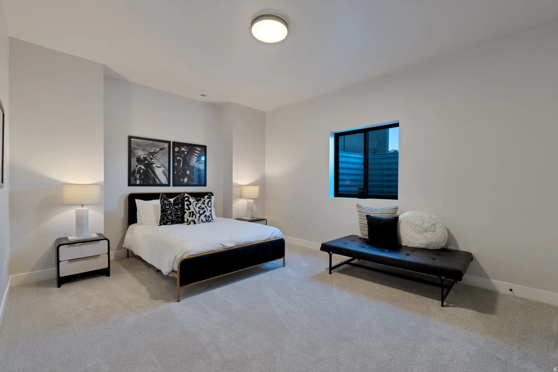 Bedroom with carpet flooring and baseboards