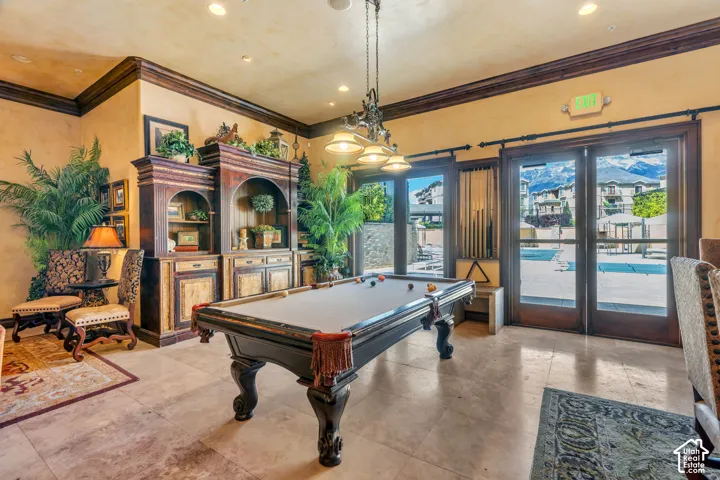 Game room featuring ornamental molding, billiards, and recessed lighting