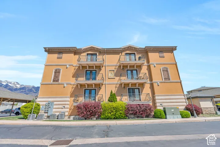 View of apartment building / complex with a mountain view