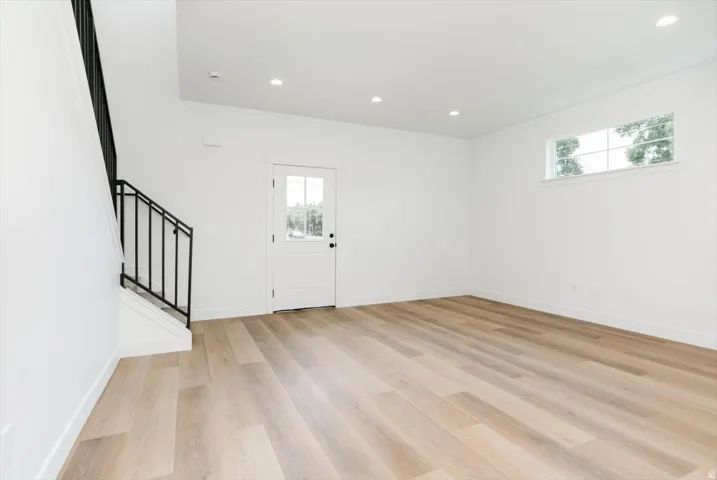 Entryway featuring recessed lighting and light wood-style flooring