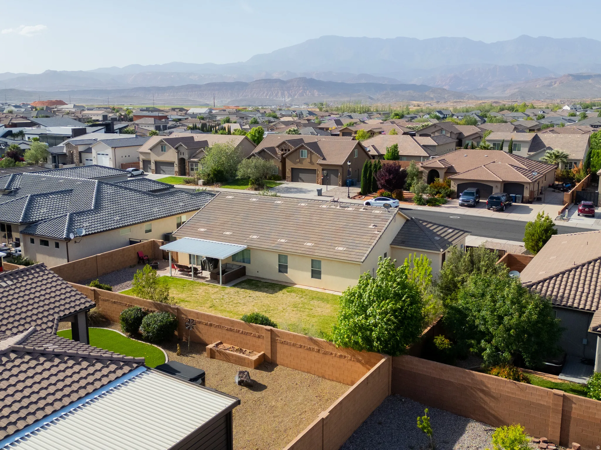 Aerial perspective of suburban area with mountains