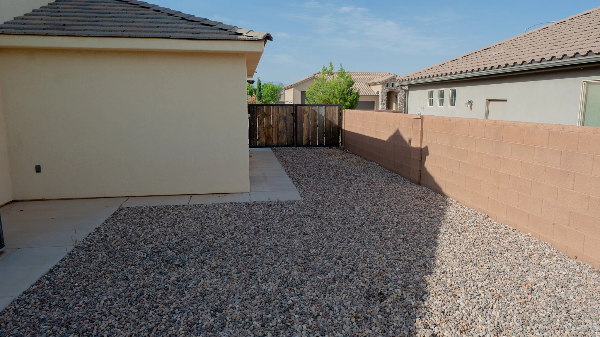 View of fenced backyard