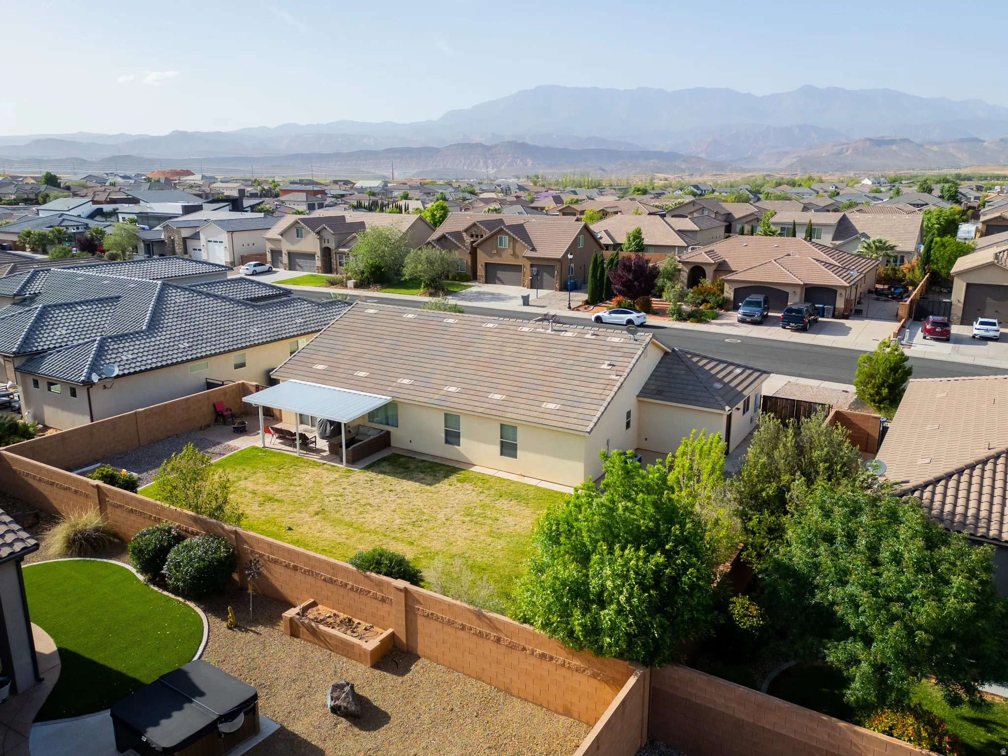 Aerial perspective of suburban area featuring mountains