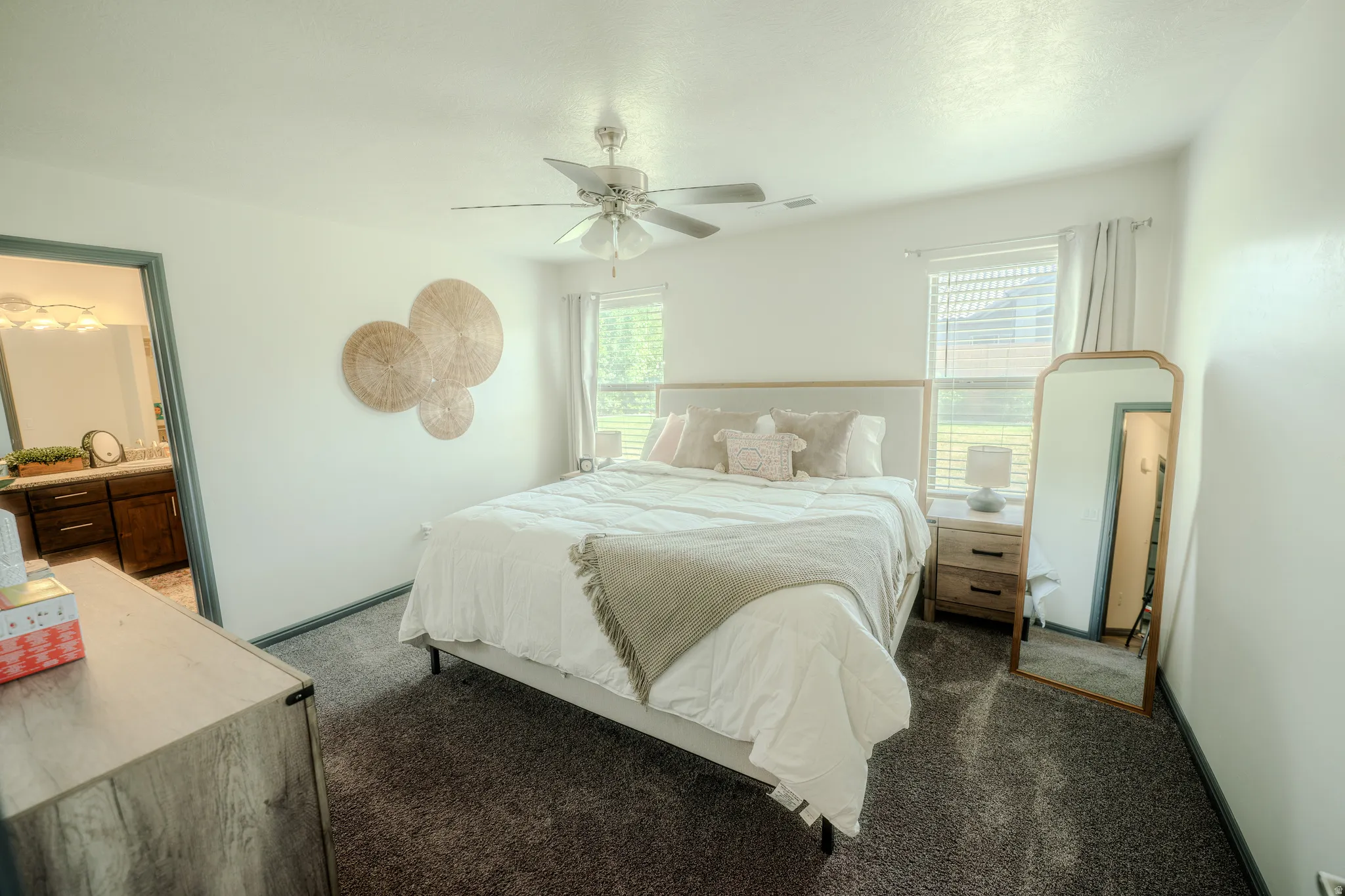 Bedroom with carpet floors and ceiling fan