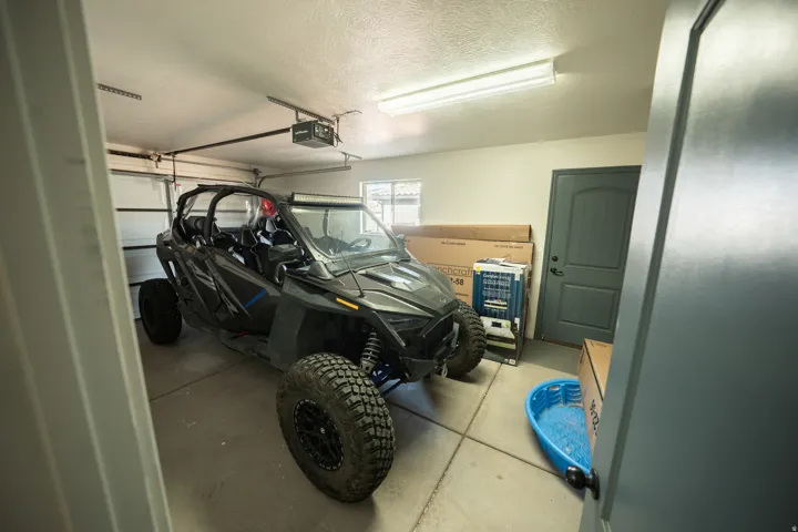 Garage featuring a garage door opener