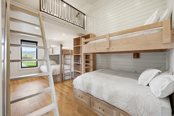 Bedroom with light wood-type flooring and recessed lighting