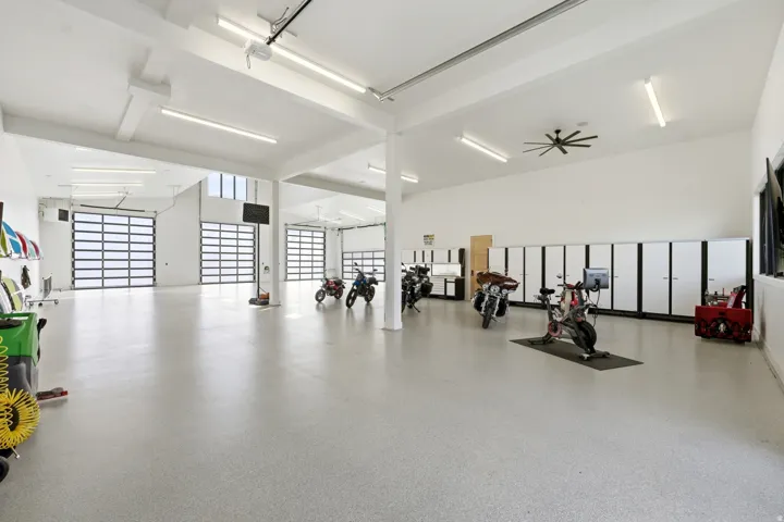 Garage featuring ceiling fan