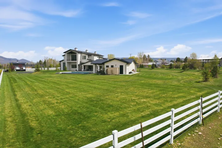 View of fenced backyard
