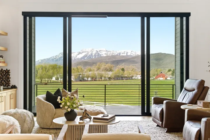 Living area featuring a mountain view and plenty of natural light