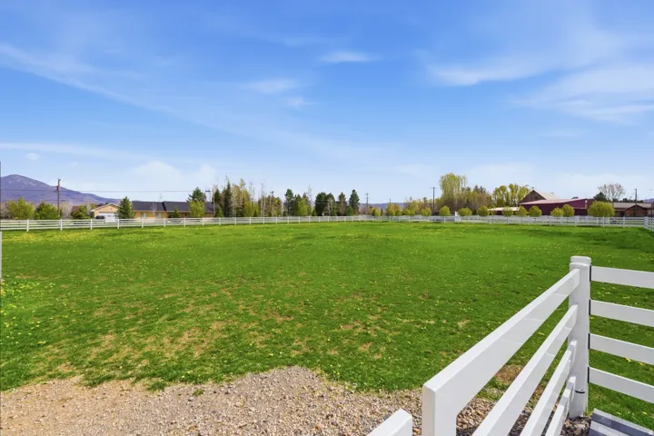 View of yard with a mountain view and a view of countryside