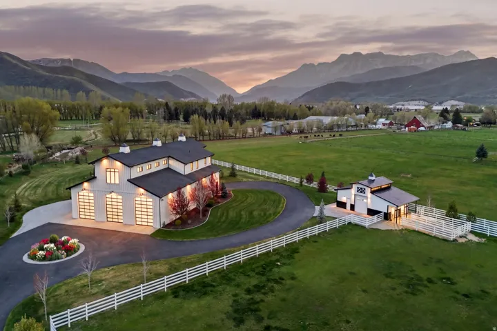 Aerial view at dusk of a mountain view and a rural view