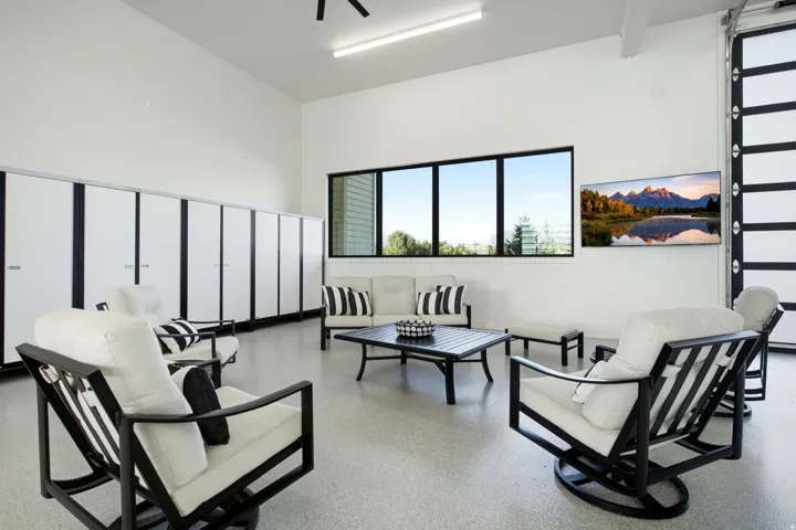 Spacious interior with high ceilings, recessed lighting, and resilient flooring