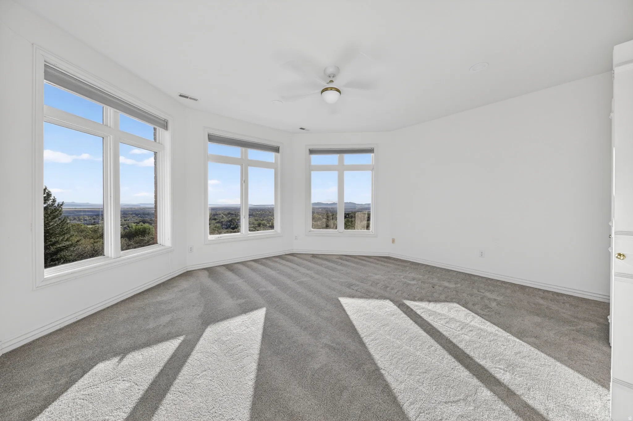 Bedroom featuring a ceiling fan, recessed lighting, and carpet flooring