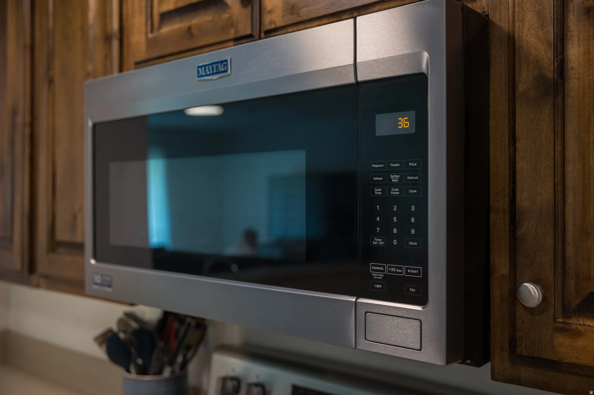 Kitchen view of stainless steel microwave