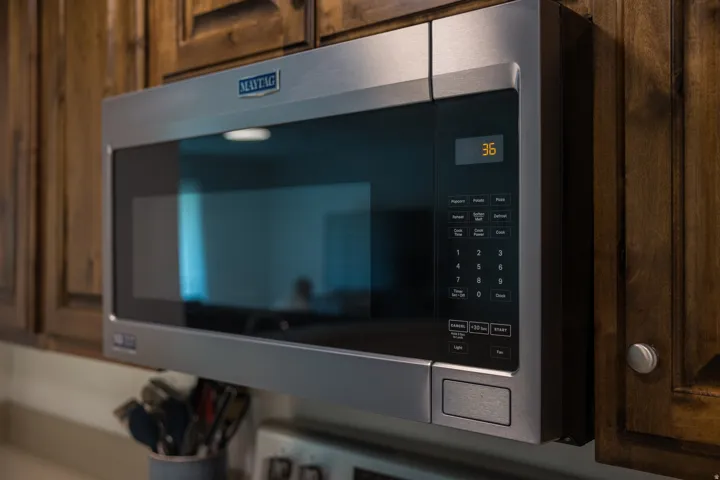 Kitchen view of stainless steel microwave