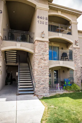 View of apartment building / complex with stairs