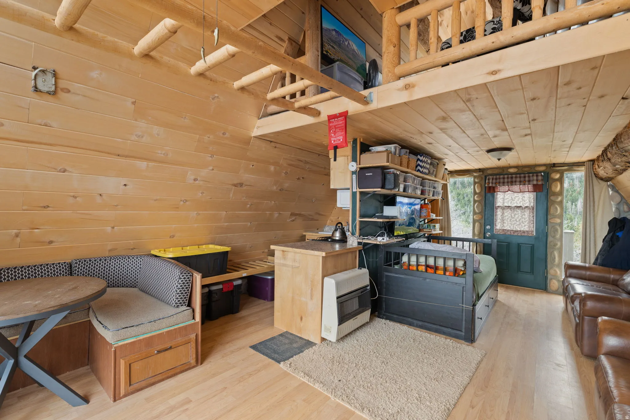 Main level with family room, dining area and wood burning stove