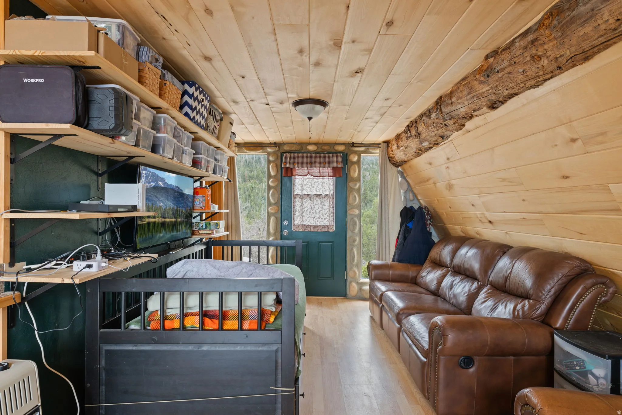 Main level with family room, dining area and wood burning stove