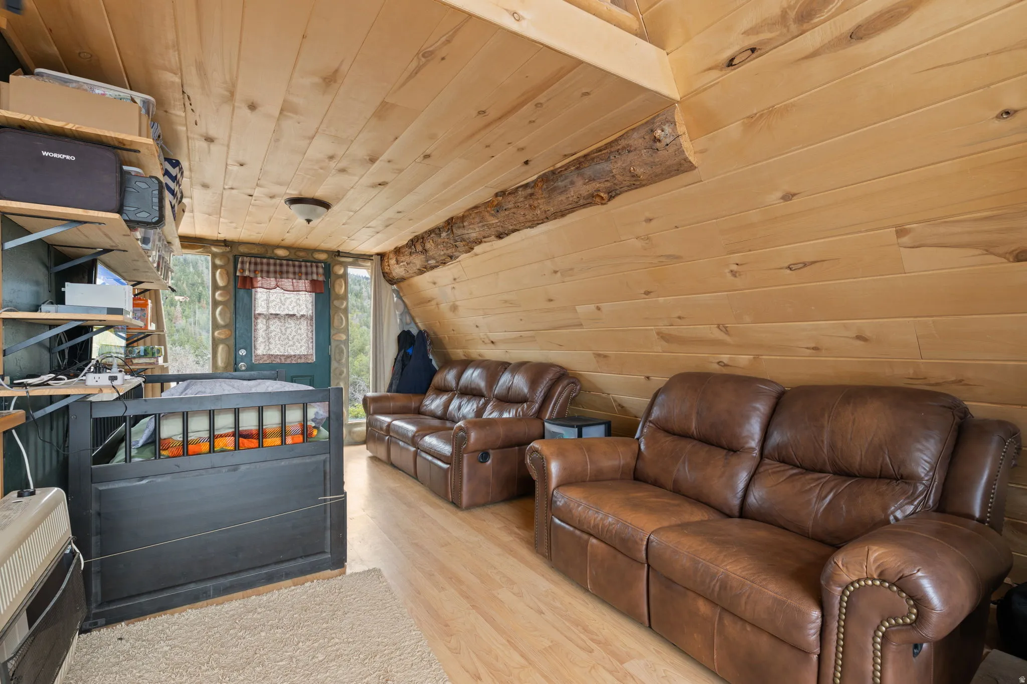 Main level with family room, dining area and wood burning stove