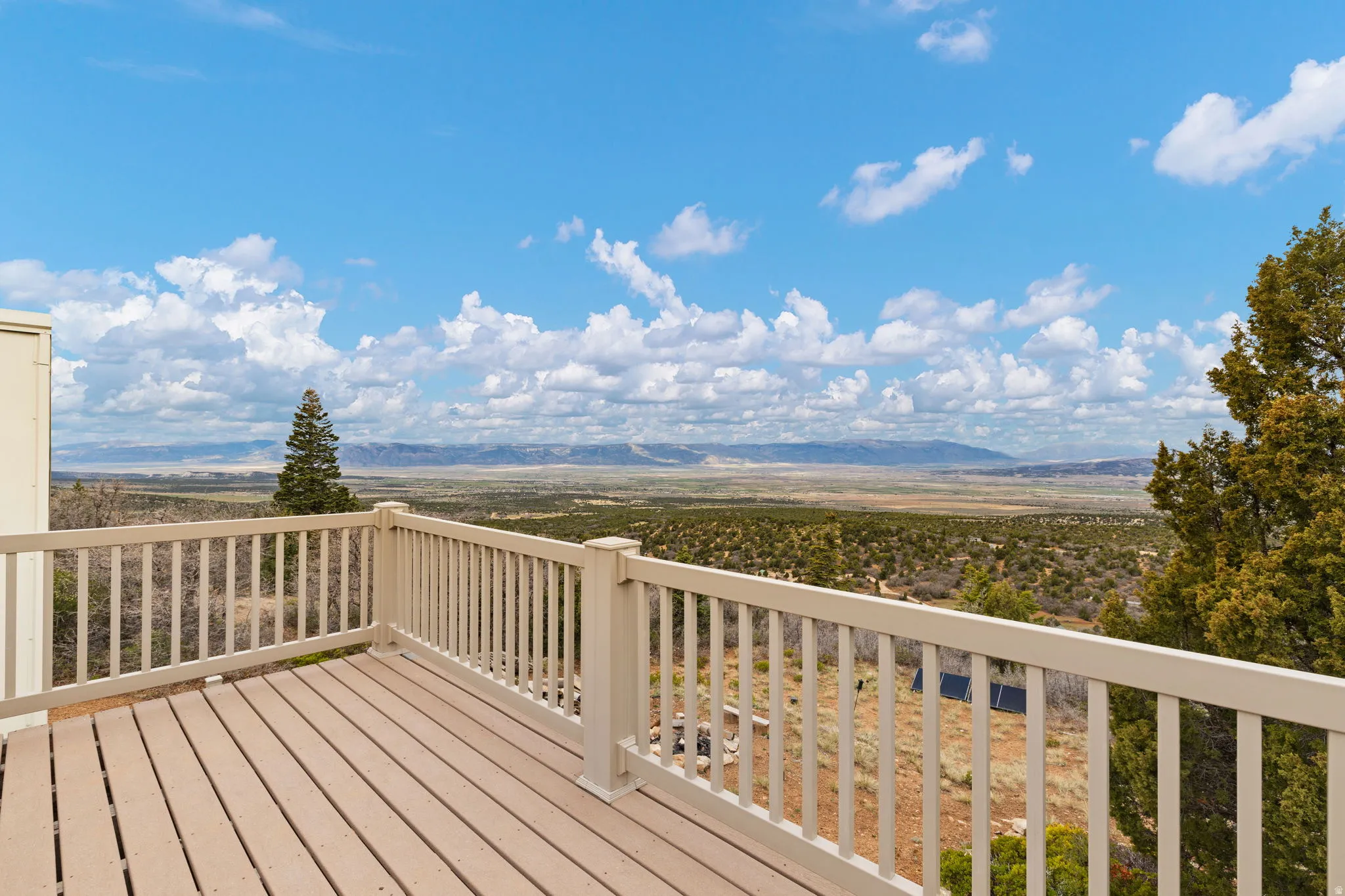 Wooden deck featuring a mountain view