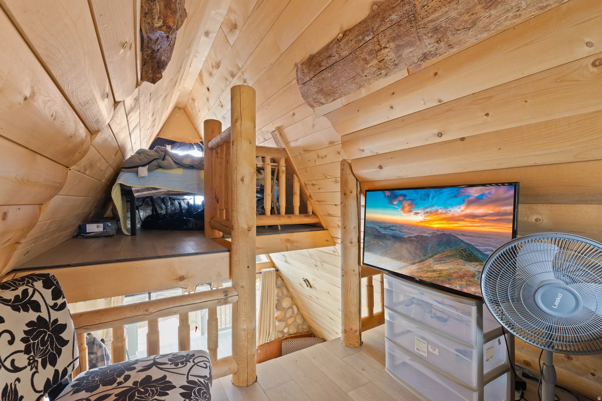 3rd level loft with bed and window