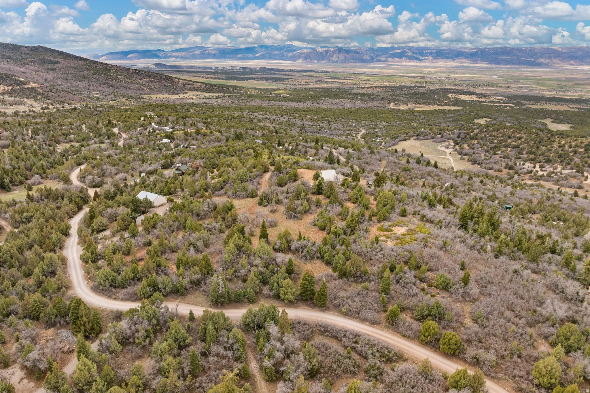Drone / aerial view of a mountainous background