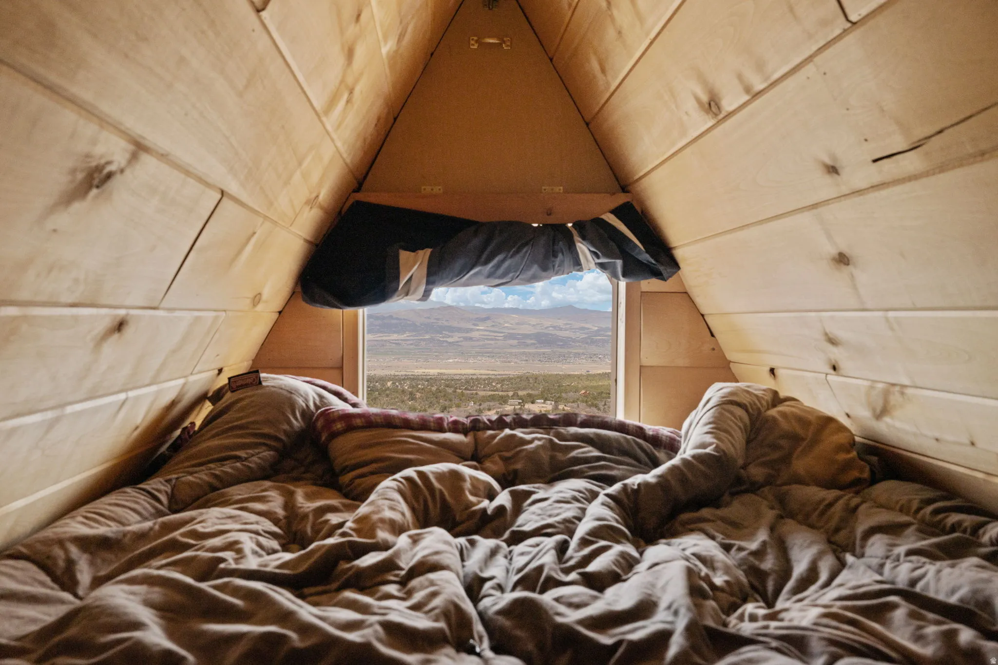 3rd level loft with bed and window