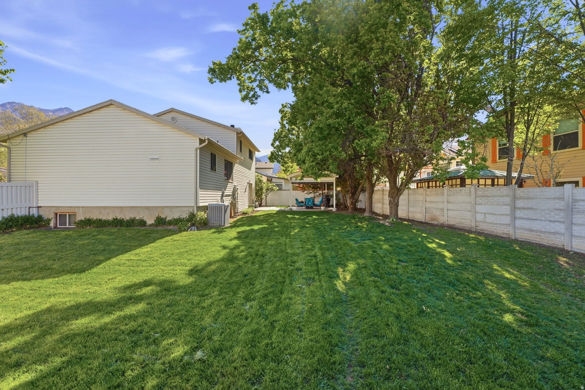 View of fenced backyard