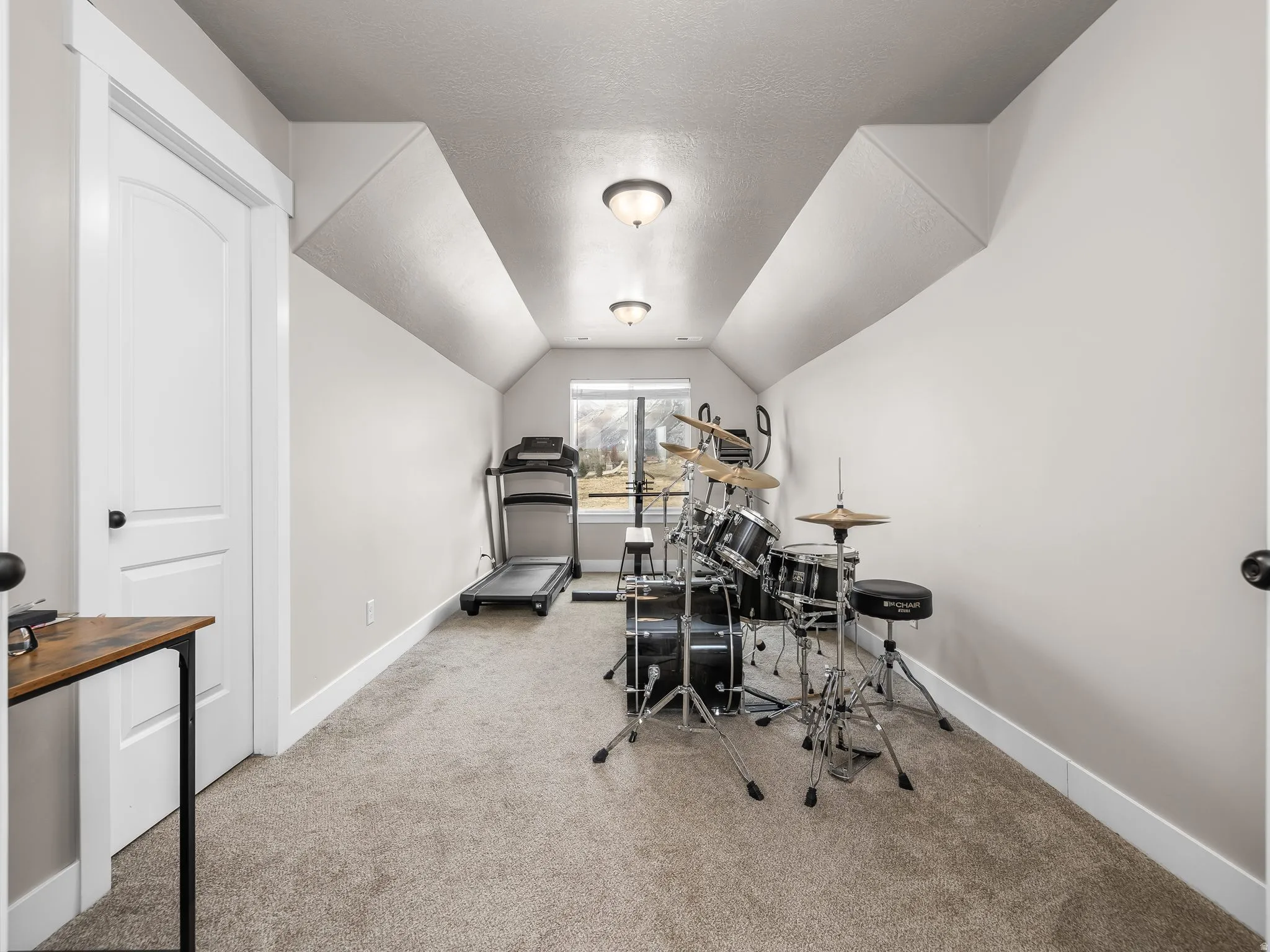 Second floor loft gym/bedroom.