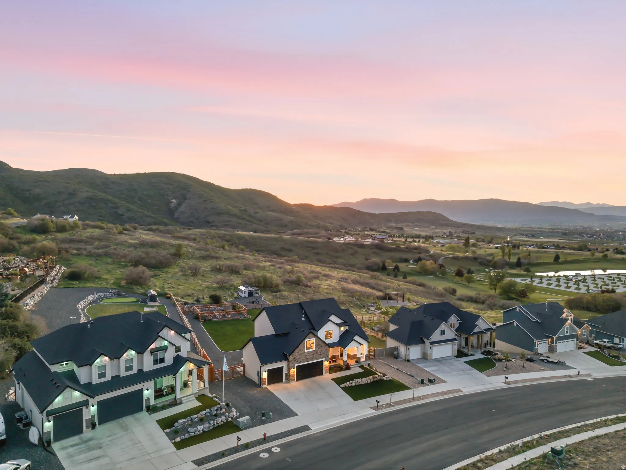 View of mountain backdrop with nearby suburban area