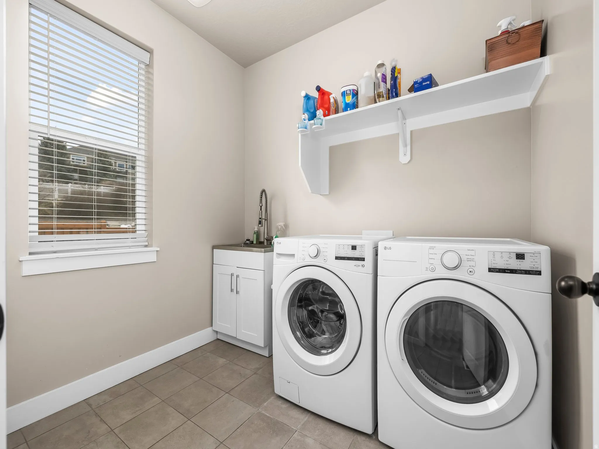 Half bath and laundry room on the main floor.