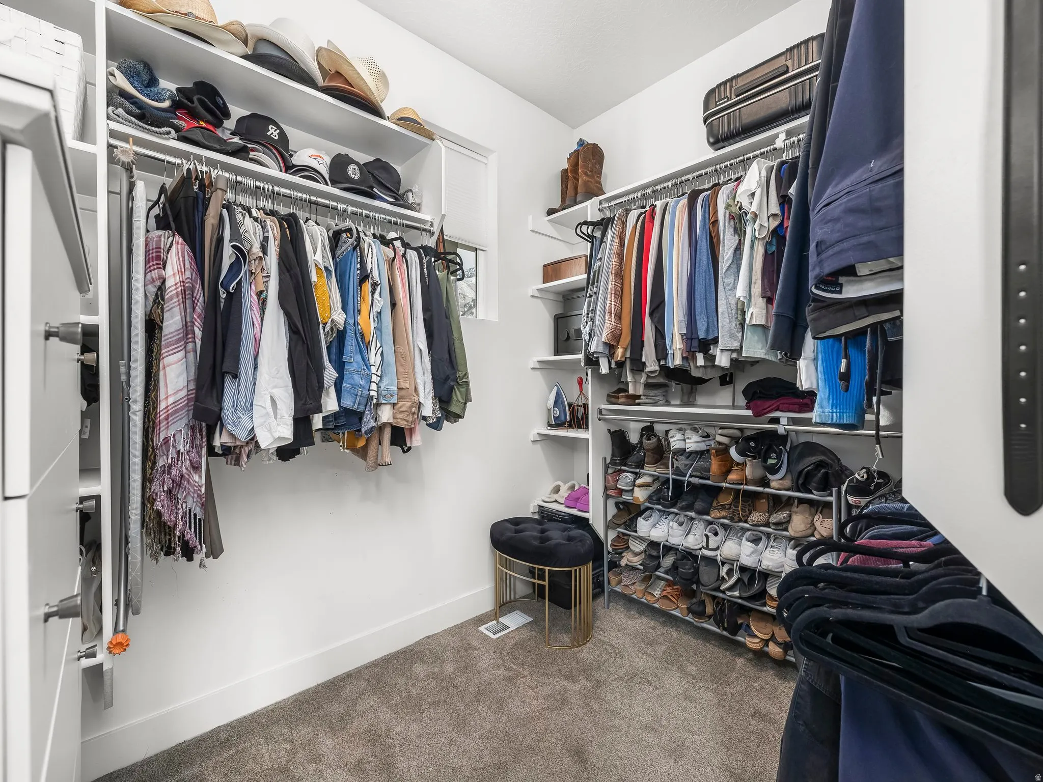 Primary Bedroom walk in closet.