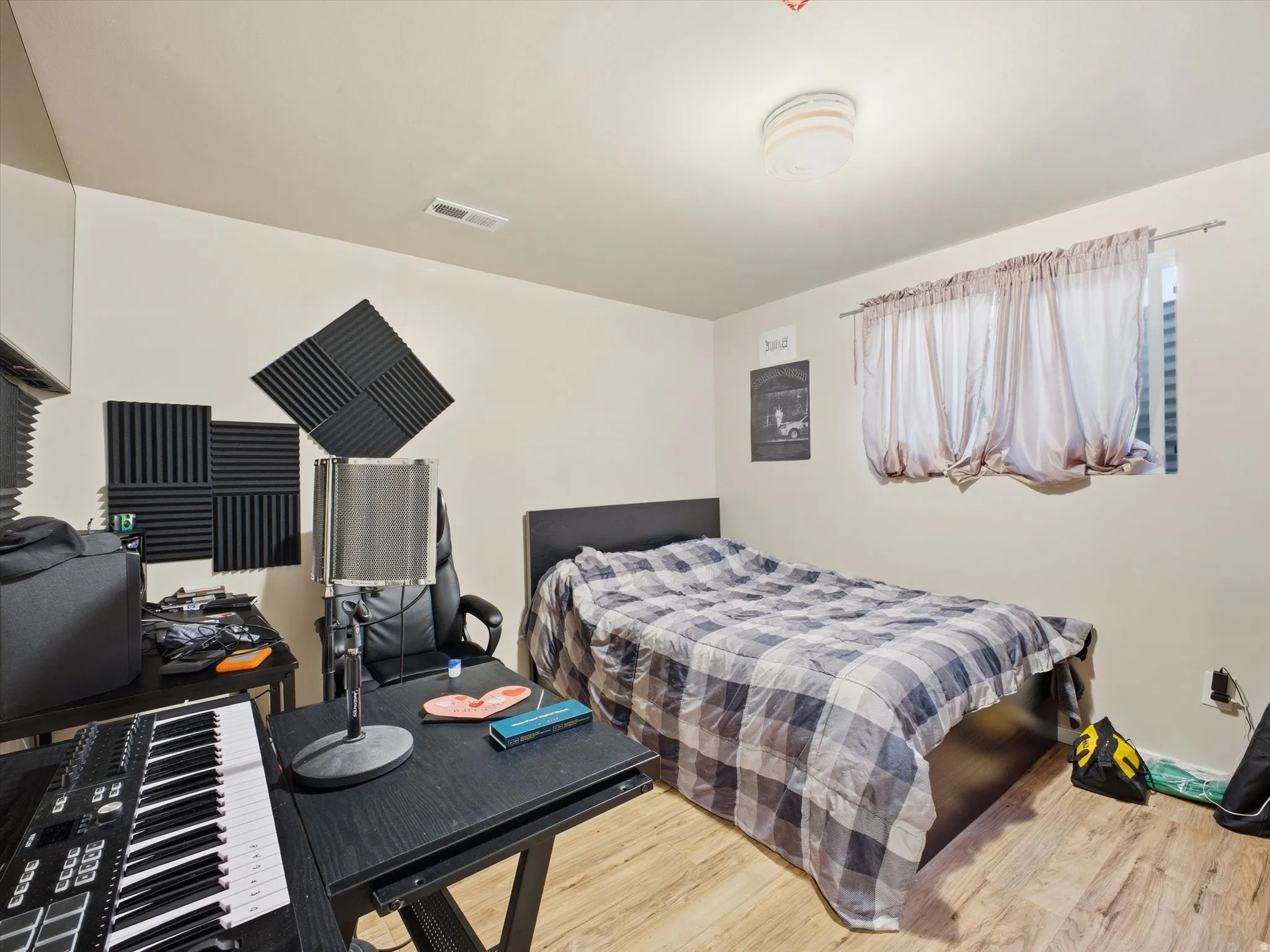 Bedroom with wood finished floors