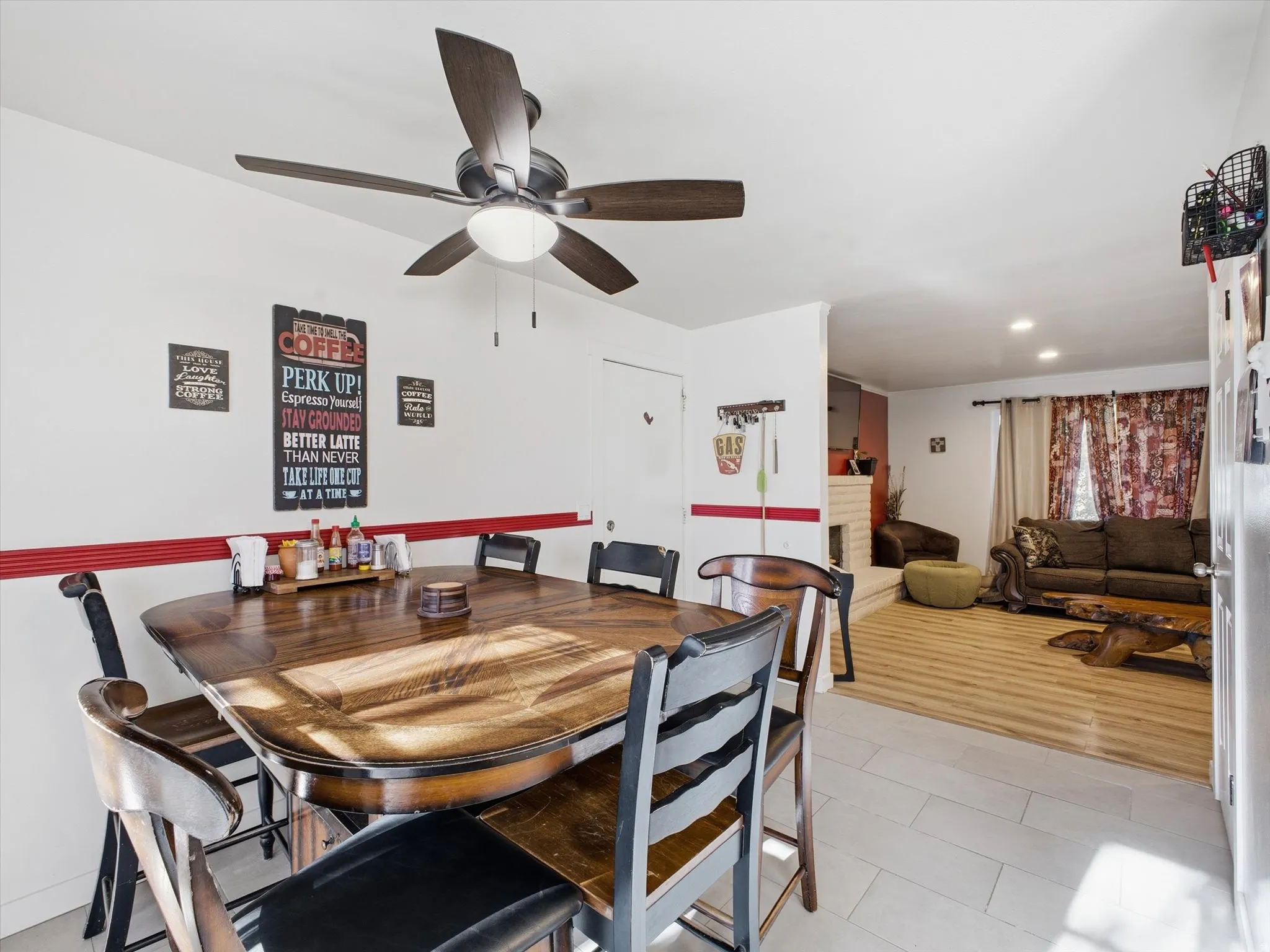 Dining space featuring a ceiling fan, and recessed lighting