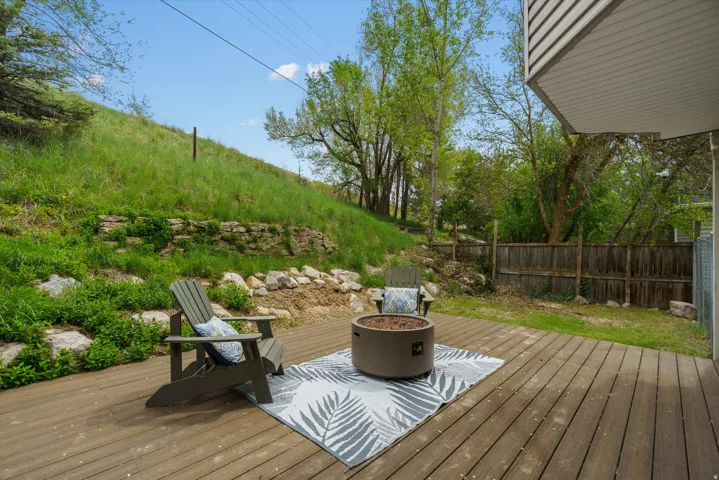 Wooden deck with an outdoor fire pit