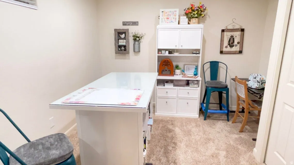 Office space with light colored carpet