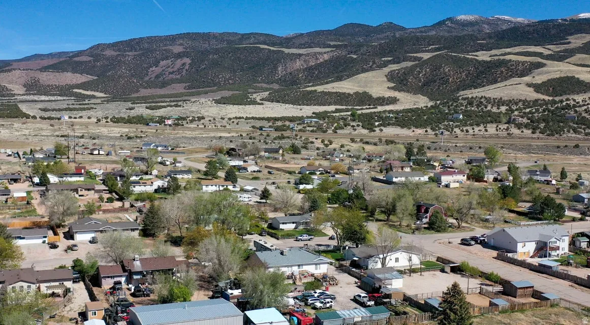 Aerial view of residential area with mountains