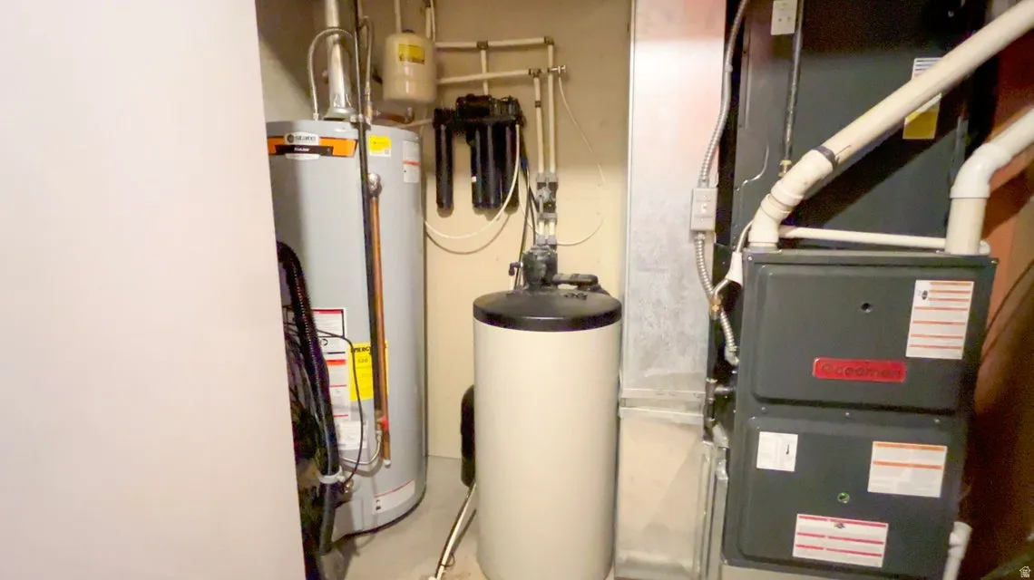 Utilities featuring heating unit and water heater