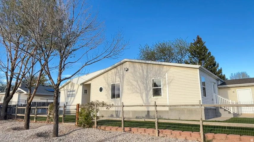 View of front of house featuring a fenced front yard