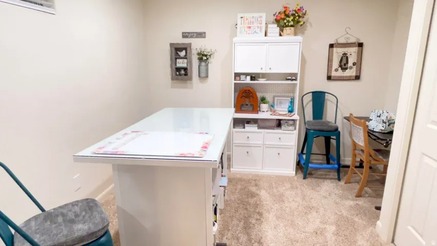 Office space with light colored carpet