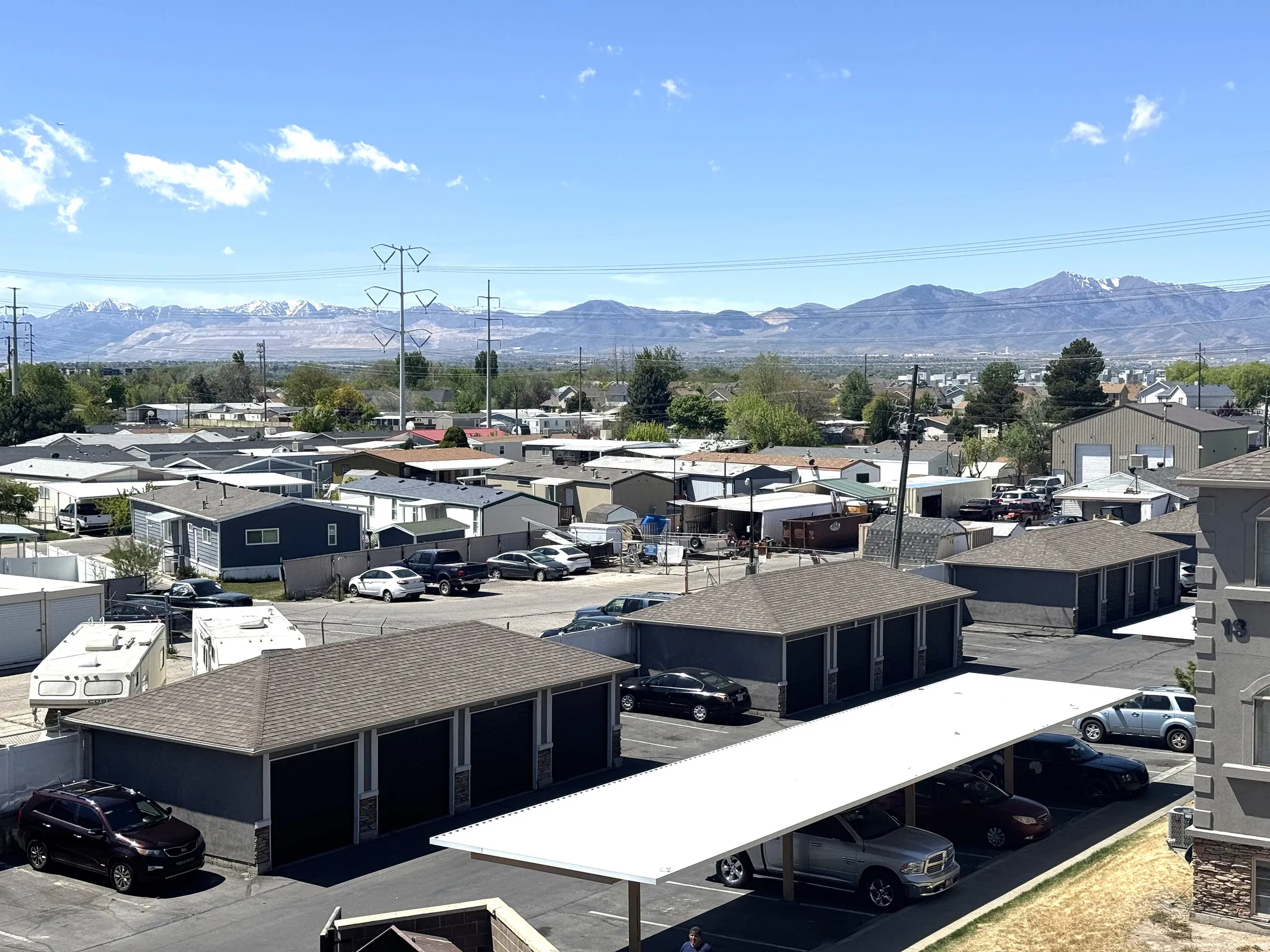 Aerial perspective of suburban area with a mountainous background