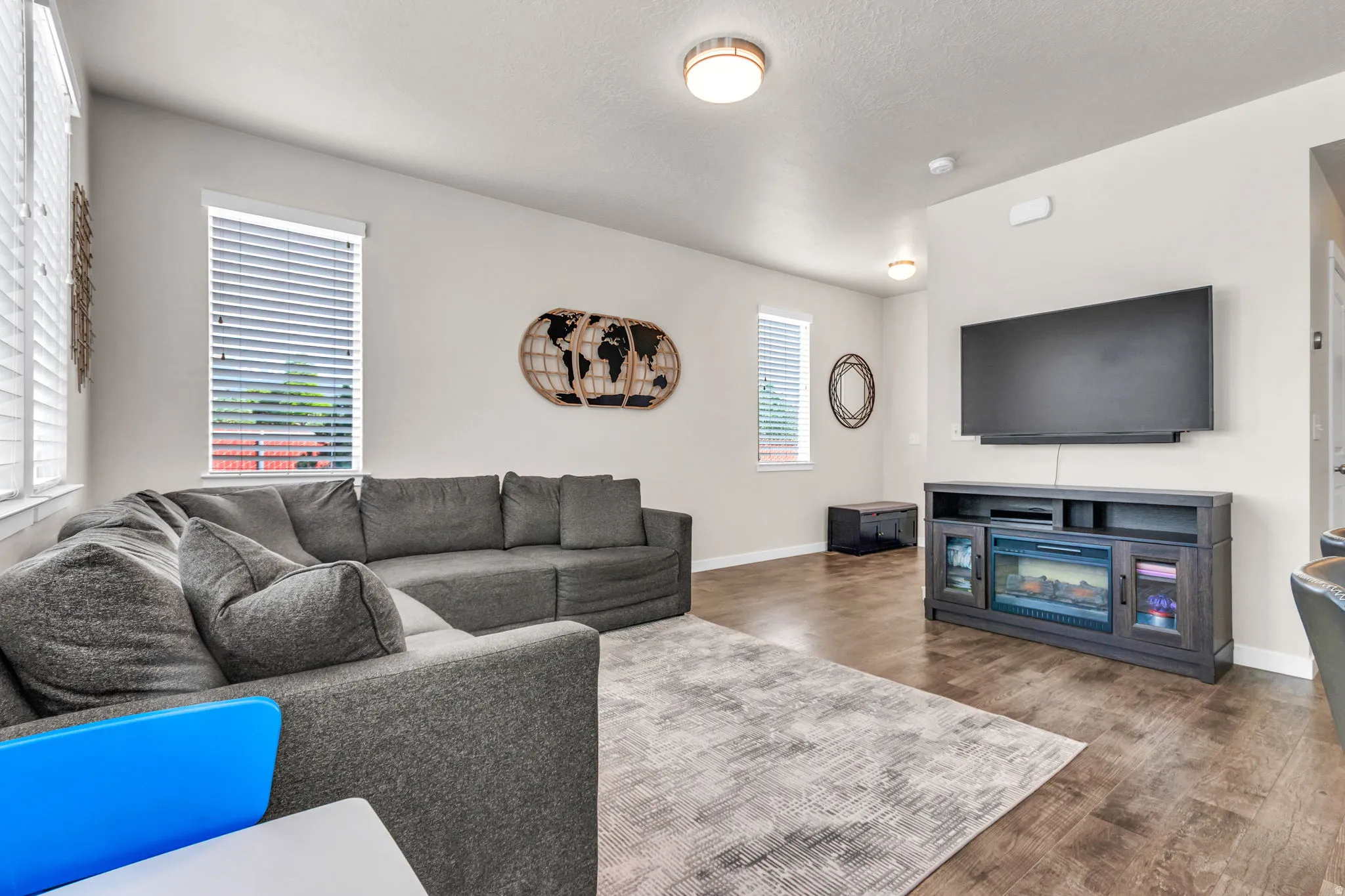Living room featuring wood finished floors and baseboards