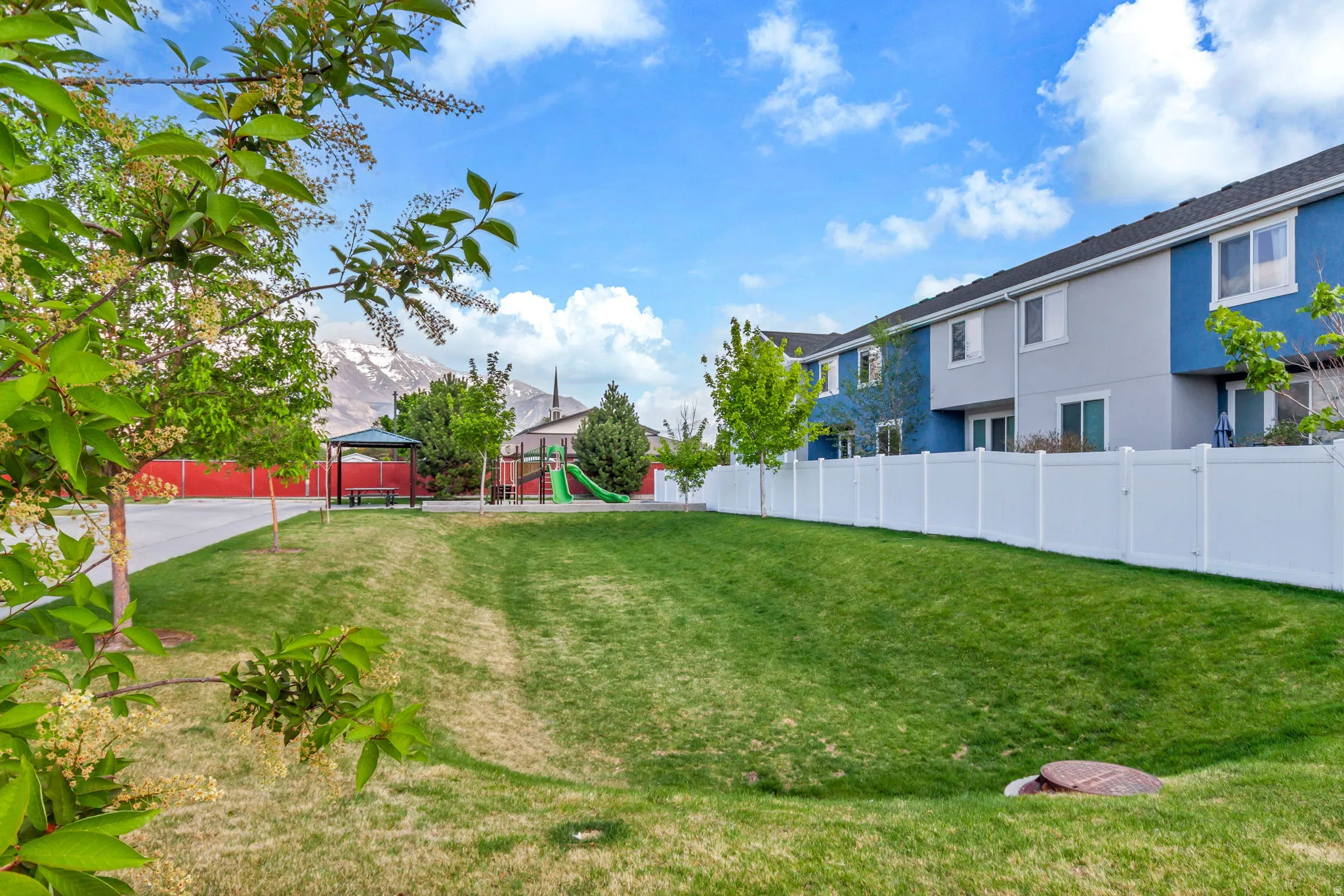 View of fenced backyard