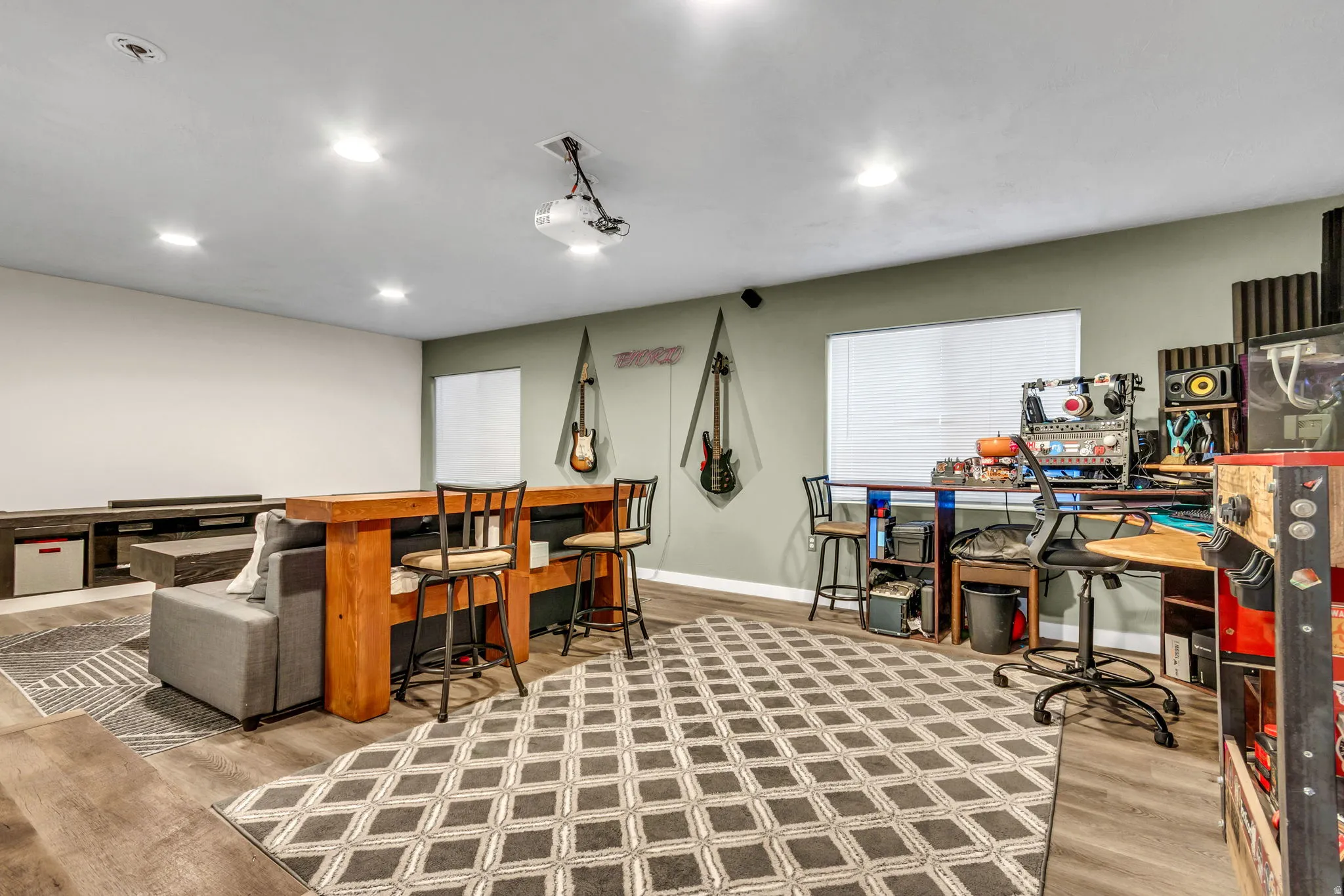 Game room featuring light wood-style flooring and recessed lighting