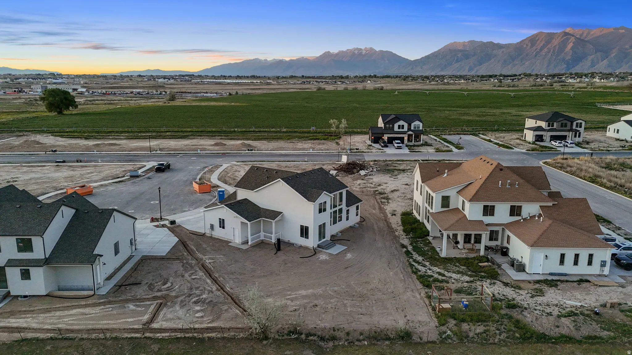 Aerial view of residential area featuring mountains